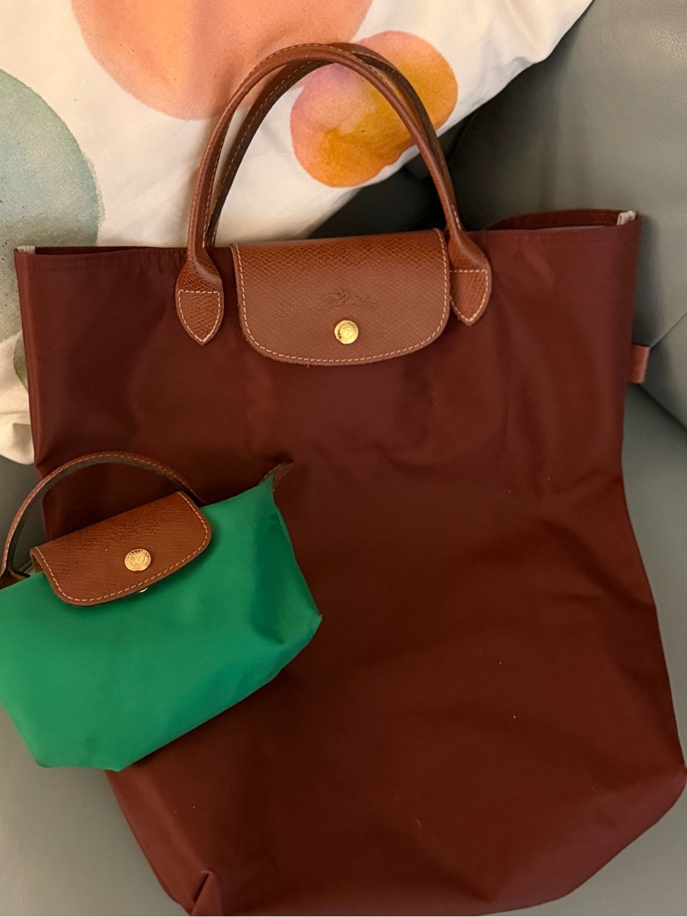 (2) Longchamp Le Pliage Totes Burgundy tote and Green cosmetic pouch